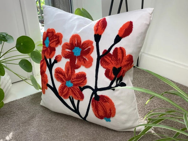 Funda cojín bordada flores terracota