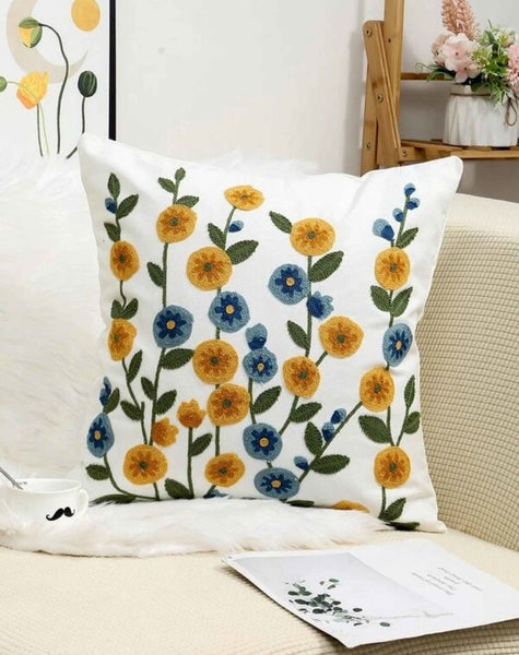 Funda cojín bordada flores turquesa