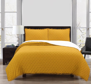 Quilt mostaza 2P pompón
