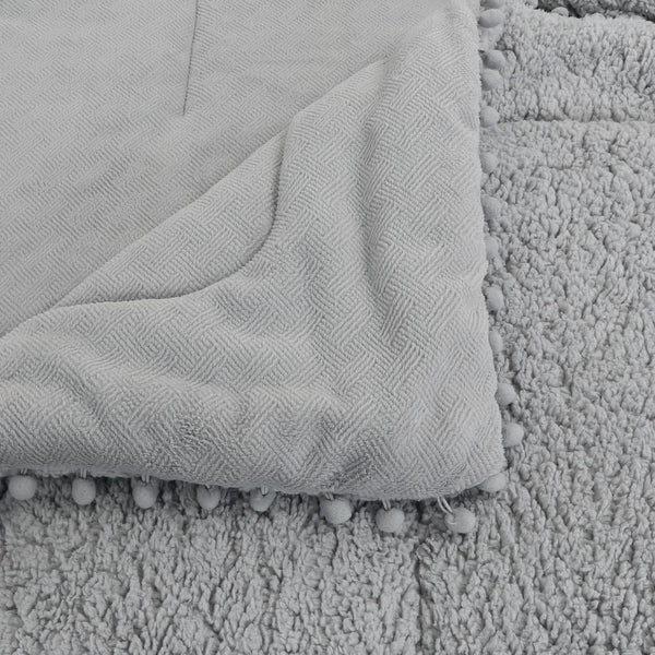 Cubrecama 2P reverso de polar Gris con pompón