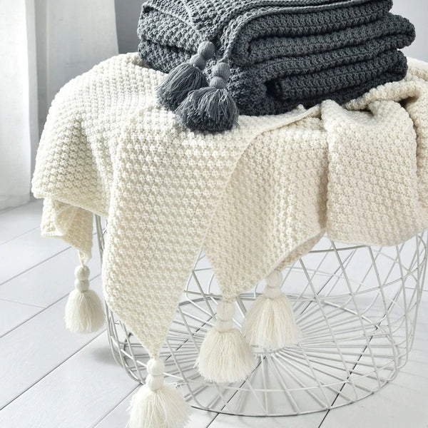 Manta con borlas y pompón Gris